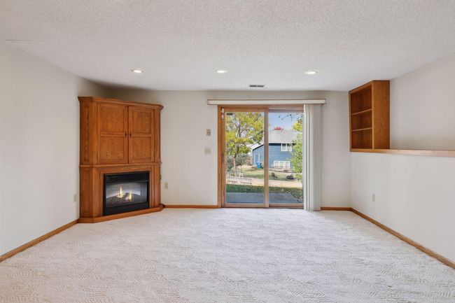 Electric fireplace stays with the home | Image 31