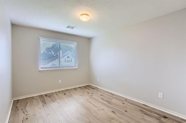 Secondary bedroom #1 - beautiful luxury vinyl flooring installed in 2023 | Image 30