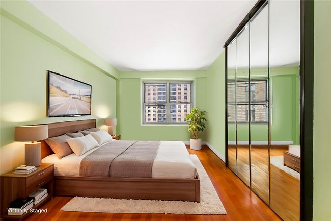 Bedroom with hardwood / wood-style floors | Image 4