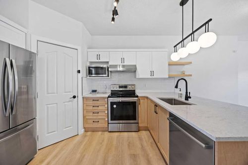201-2066 Luxstone Blvd Sw, Airdrie, AB, T4B0L1 | Card Image