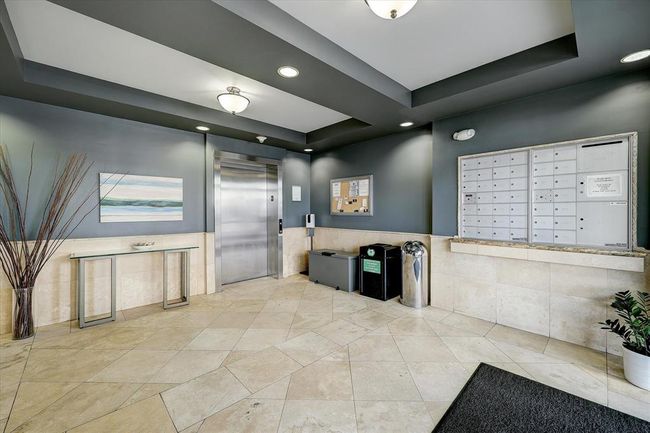 The inviting lobby includes a handy mail area and easy access to the elevator. | Image 24