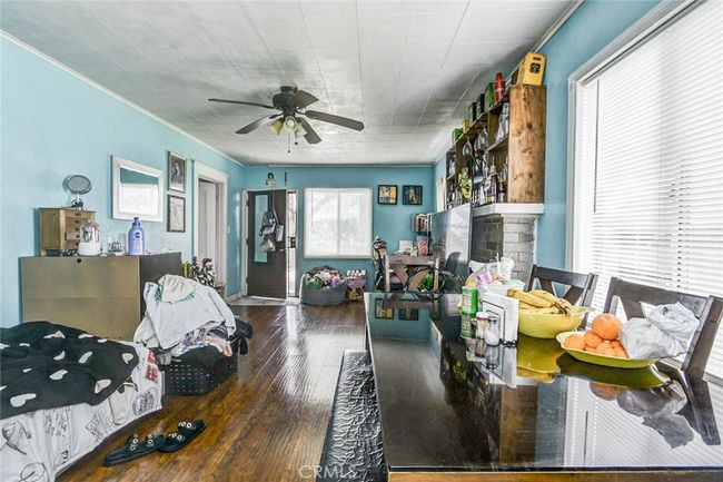 Harwood floors and fireplace in living room | Image 17