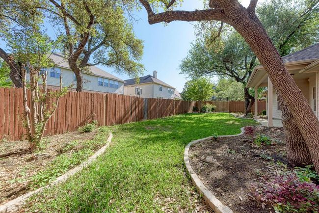 View of yard featuring a fenced backyard | Image 35
