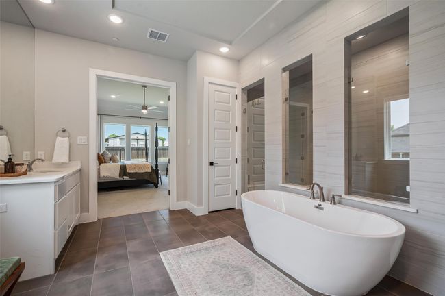 Amazing large wall to wall shower and soaking tub. | Image 16