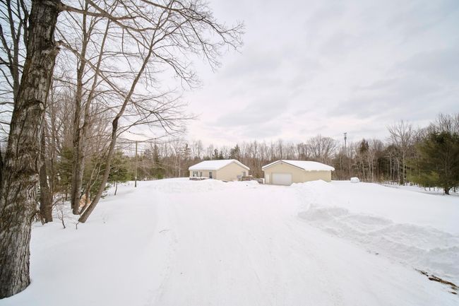 Blacktop driveway under snow! | Image 42