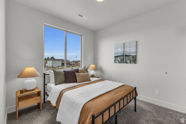 Bedroom featuring carpet floors | Image 26