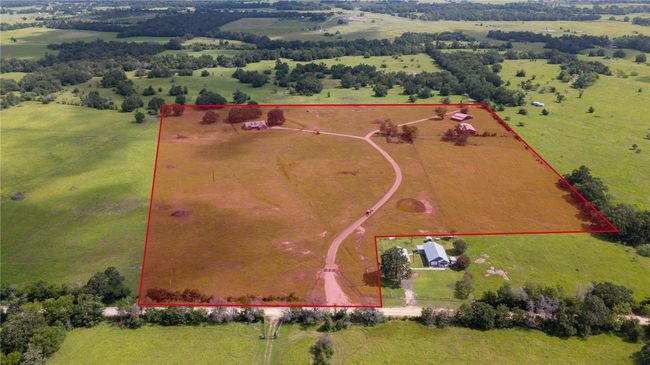 Overview of rural landscape featuring property parcel outlined and agricultural land | Image 5