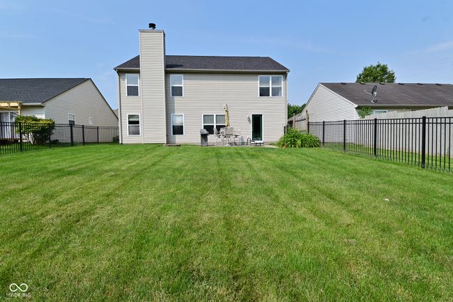 rear view of house with a chimney | Image 46
