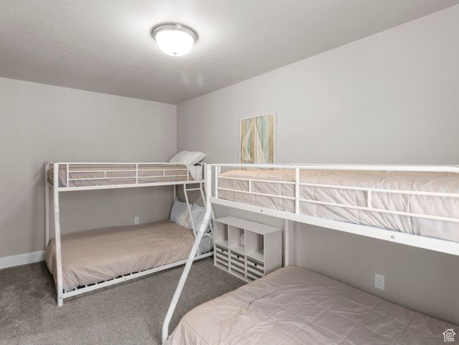 Bedroom with baseboards and carpet floors | Image 19