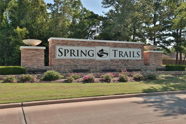 The welcoming neighborhood sign marks the entrance to a community that offers a wealth of amenities, including walking trails, sports park, a clubhouse with a sparkling pool, and a playgrounds for the whole family to enjoy. It’s a place where neighbors connect and families thrive. | Image 29