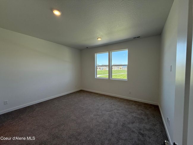 Primary Bedroom w/ green space / park views! | Image 13