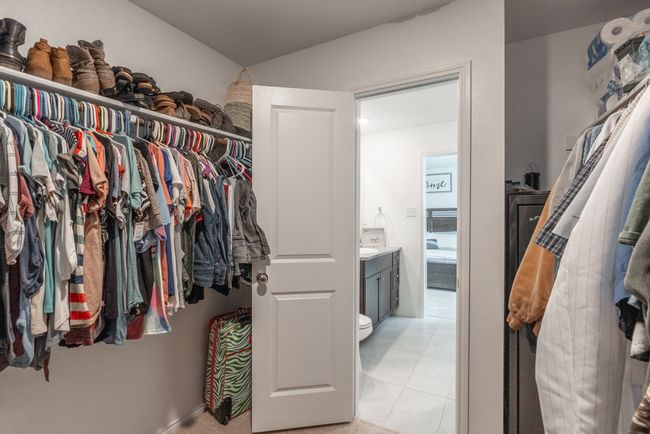 Walk in closet with light tile patterned flooring | Image 9