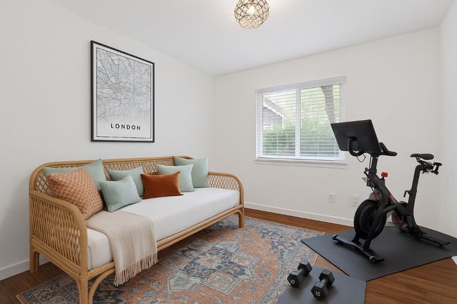 Bedroom #3 is virtually staged/revisioned as a workout/guest space. | Image 19
