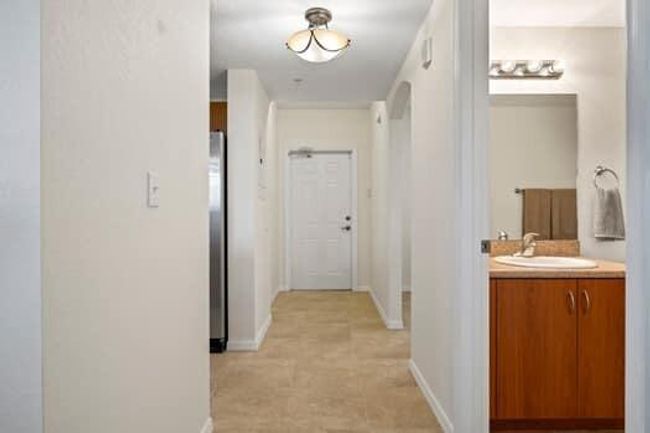 UNIT-34 - 4190 Gator Greens Way, Condo with 3 bedrooms, 3 bathrooms and null parking in Fort Pierce FL | Image 8