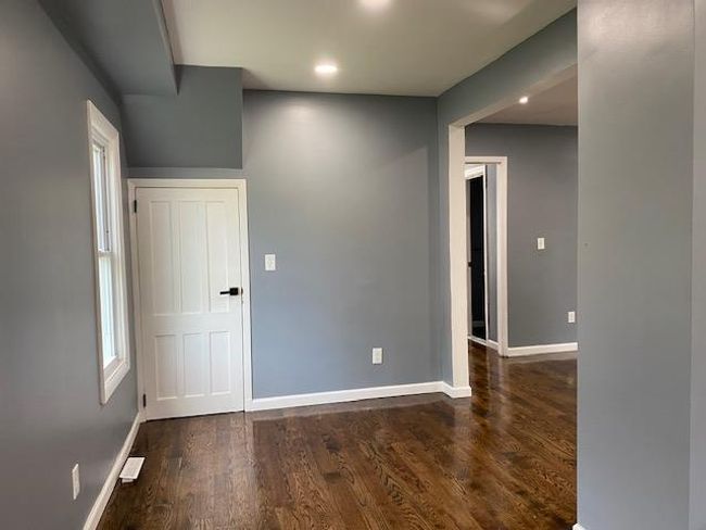 Empty room featuring recessed lighting, dark wood-type flooring, and plenty of natural light | Image 11