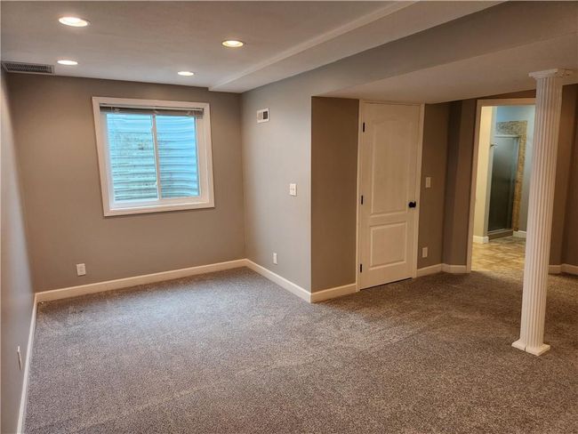 Finished below grade area with carpet and recessed lighting | Image 14