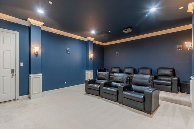 large downstairs media room, soundproofed with larger studs + heavy insulation | Image 31