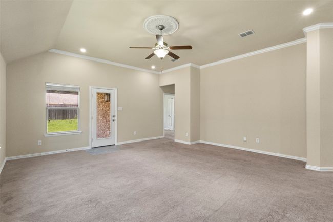 Living room with ceiling fan, carpet, recessed lighting, and crown molding | Image 12