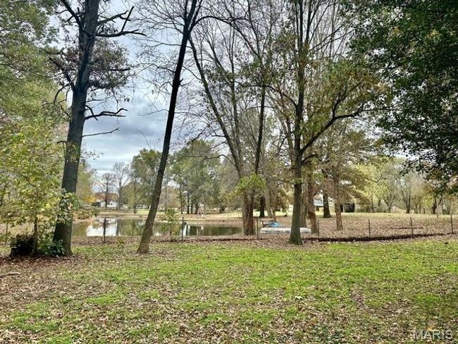 View of yard featuring a water view | Image 15