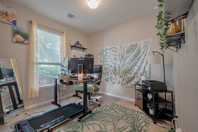 Bedroom currently being used as an office | Image 5