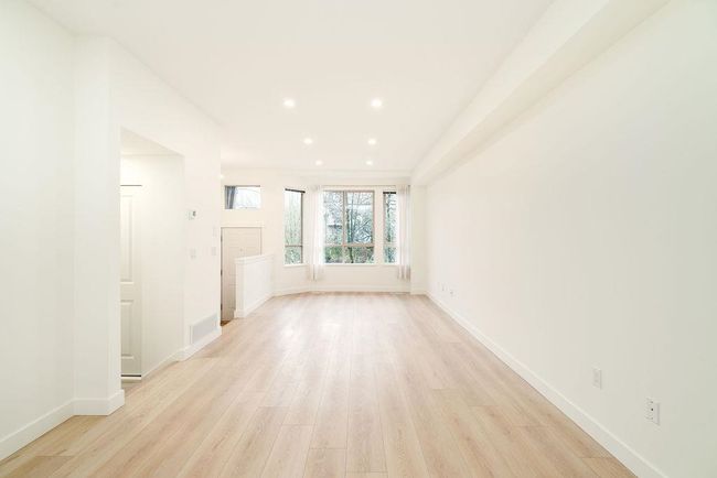 Spare room with baseboards, light wood-style flooring, and recessed lighting | Image 19