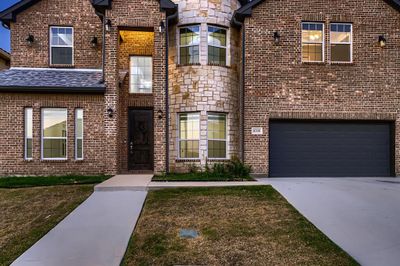 View of front of property with a garage | Image 3