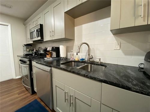 704 Dunbar Dr, Dunwoody, GA, 30338-6549 | Card Image