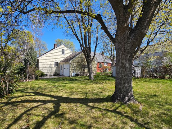 View of yard with an attached garage | Image 31