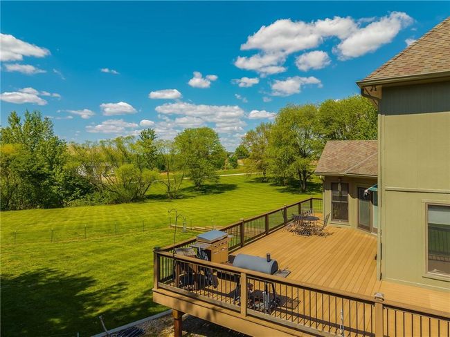 Wooden deck featuring a yard | Image 14