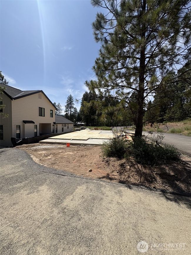 As the newest PNW master-planned community, enjoy 200+ acres of open space, trails & the Coal Trax Mt Bike Park. Soaring ceilings in the great roommake each day worthy of celebration & open floorplan appeals to entertaining. Covered deck & patio. Southern-facing homesites range from the mid600s- 900ks. Enjoy a variety of innovative & distinctive new home options with the best all-season recreation just moments away! Built for the future, indulge in a retreat just 90-min to Seattle. Plans and elevations are artist’s renderings only, may not accurately represent the actual condition of a home asconstructed and may also contain options and upgrades which are not included in the sale. Trailside Homes reserves the right to make changes to the floorplan, specifications, dimensions, design and elevations without prior notice. Stated dimensions and square footage are estimated and should not be usedas representations of the home’s actual size. | Image 7