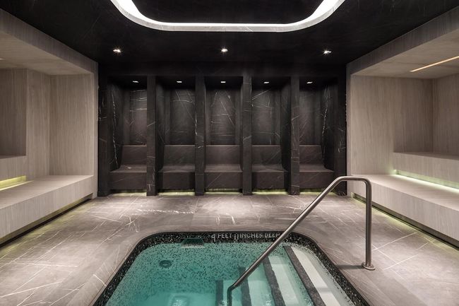 View of pool with an indoor in ground hot tub | Image 14
