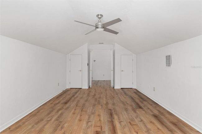 LOOKING BATH FROM UPSTAIRS 4TH GUEST ROOM TO FLEX AREA OUTSIDE OF THE DOORS | Image 56