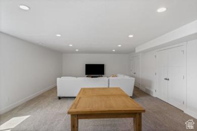 Interior space with recessed lighting, baseboards, and light carpet | Image 28