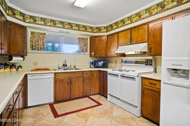5370 Cherry St, House other with 2 bedrooms, 3 bathrooms and null parking in Graceville FL | Image 24