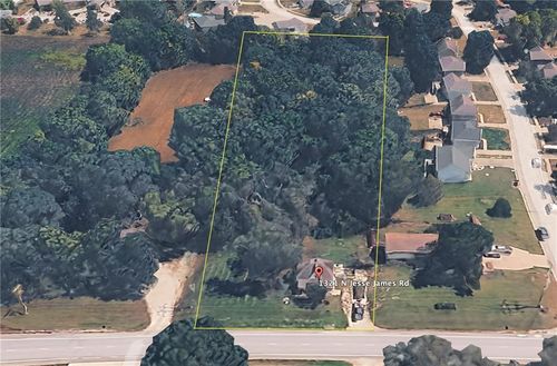 1321 N Jesse James Rd, Excelsior Springs, MO, 64024-1120 | Card Image