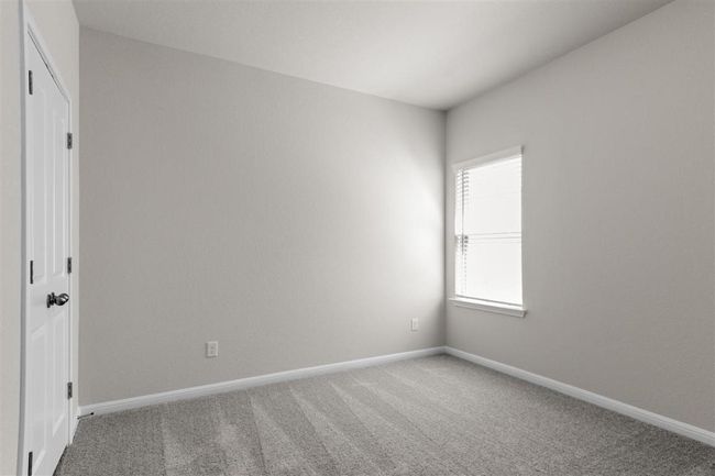 Spare room featuring carpet flooring and baseboards | Image 26