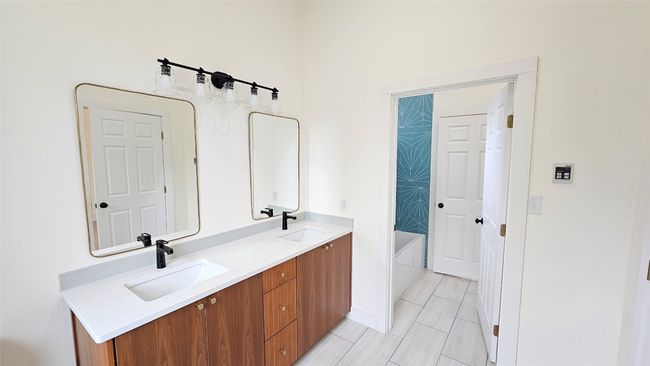 Bathroom with double vanity | Image 6