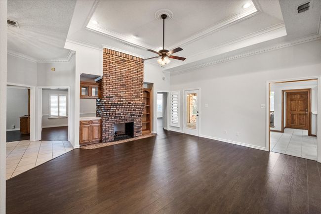 This photo of the primary living room really shows the size. Need room for family? Need a spot to entertain guests? Are you a party host? Love holidays? This is the place for you. | Image 12