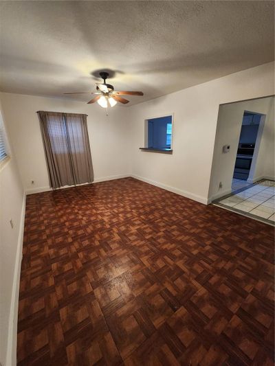 Walking into the front door looking at the living room/Family room | Image 2