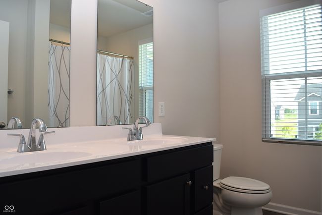 up hall full bathroom with two sinks in vanity | Image 32