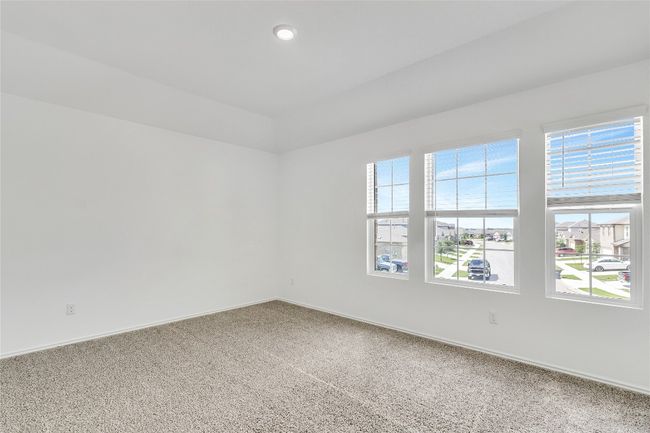 Empty room featuring carpet and baseboards | Image 25
