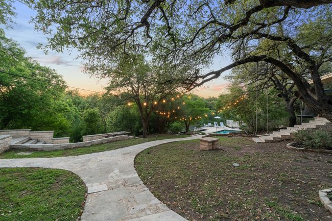 View of yard with an outdoor pool | Image 37