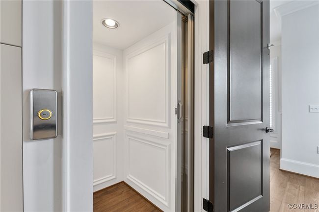 Hallway with baseboards, wood finished floors, and recessed lighting | Image 17