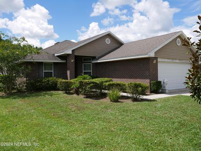 12 Burroughs Drive, House other with 3 bedrooms, 2 bathrooms and null parking in Palm Coast FL | Image 2