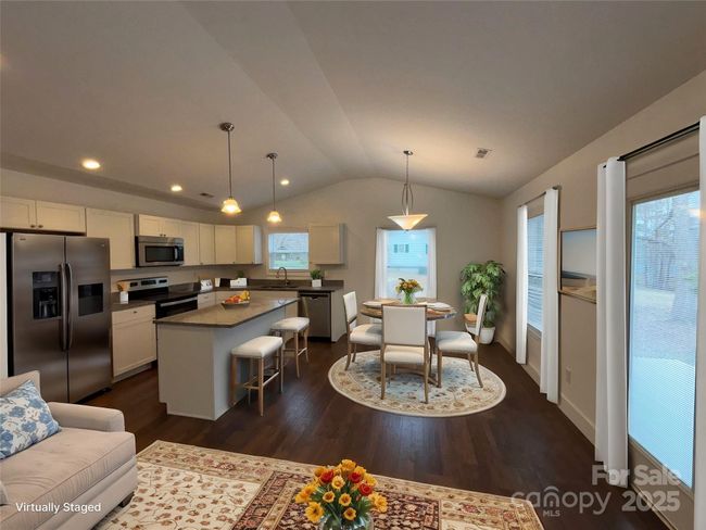 Open concept living room/kitchen is 24' long | Image 4