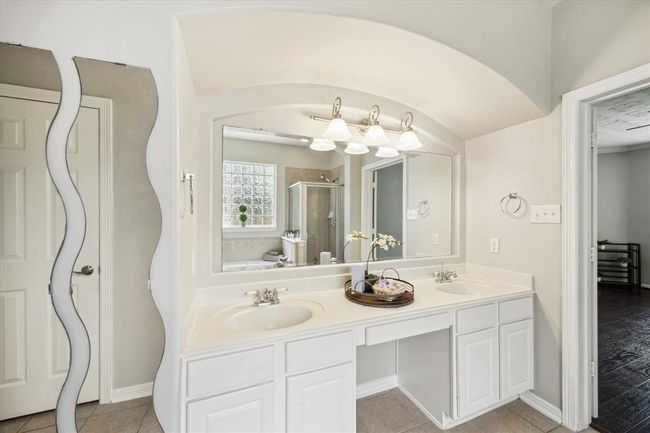 Double vanity and extra mirrors to get ready. | Image 33