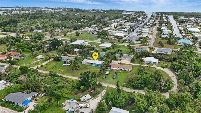 Aerial view of property and surrounding area with nearby suburban area | Image 45