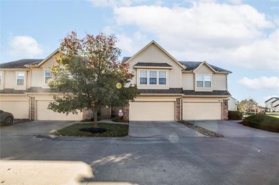 View of front of house with a garage | Image 1