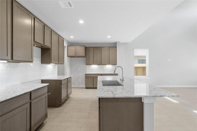 This photo is for illustrative purposes only and is not to be considered an exact replica of the finished home. Rendering does not match the finished product in terms of features, colors, landscaping, etc. Pricing, specifications, square footage and materials are subject to change at any time and without notice. | Image 4