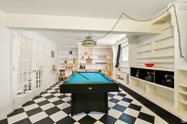 Rec room featuring tile patterned floors, billiards, and built in features | Image 13